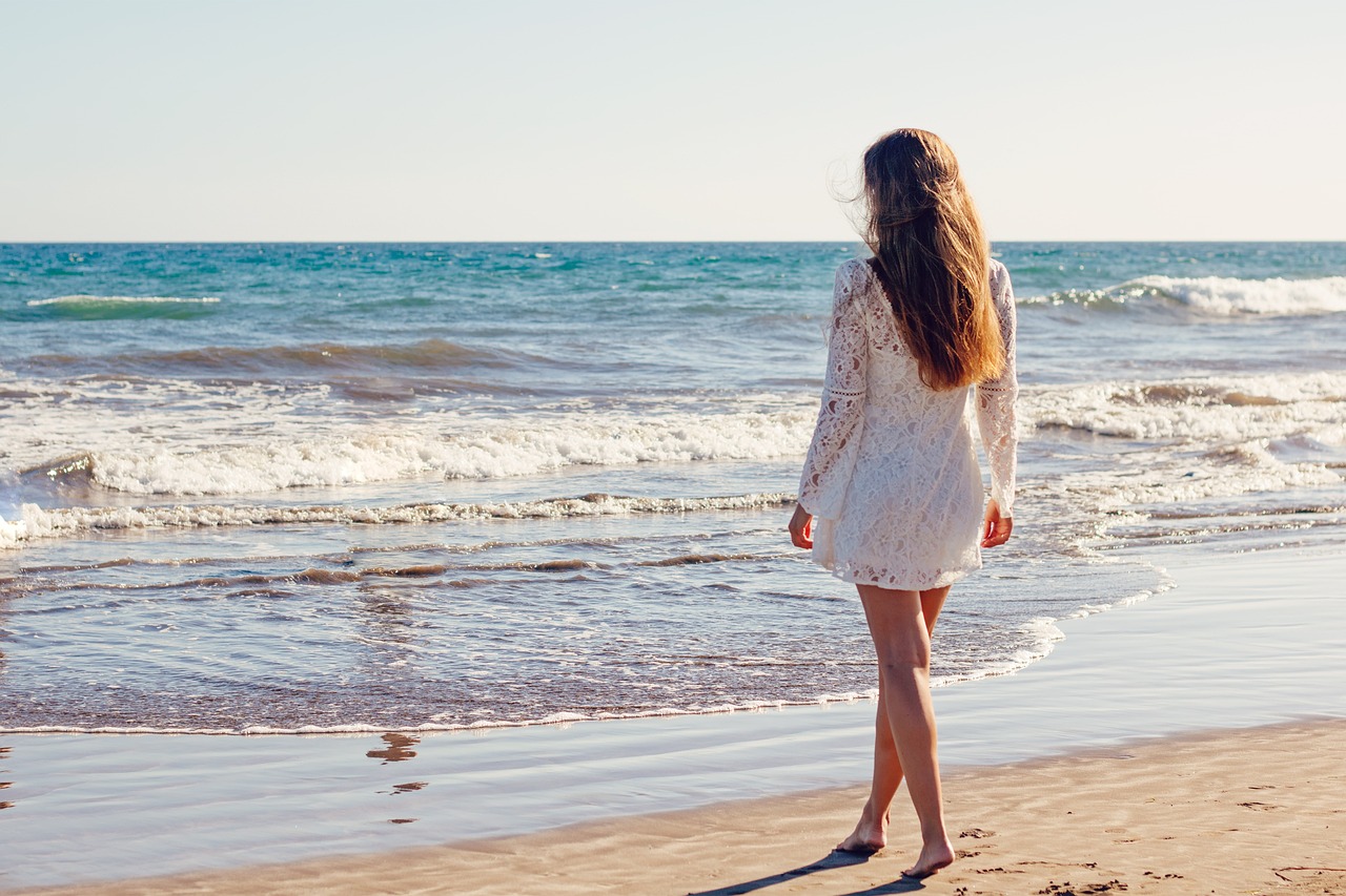 young woman, beach, dress, white dress, walking, shore, seashore, brunette, woman, sea, nature, ocean, wedding, bride, summer, model, legs, long hair,